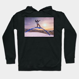 Snowboarder sliding on a rail Hoodie